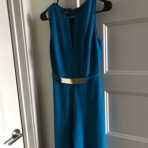 Jumpsuit with gold belt